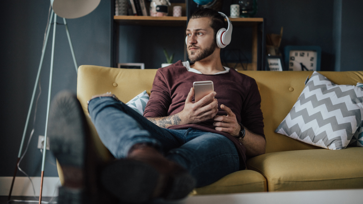 Man listens to Amazon Music on his phone