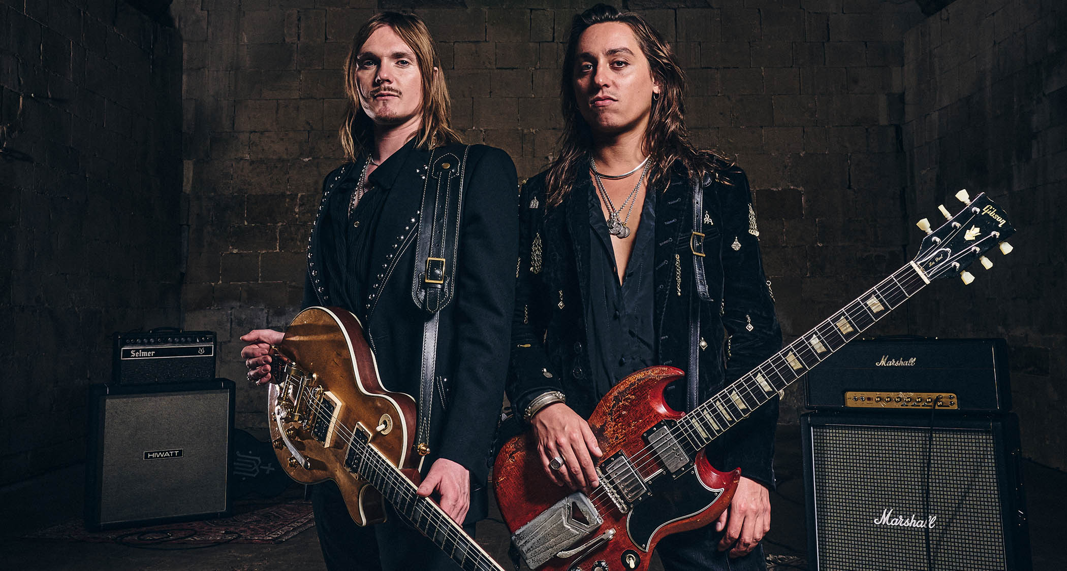 Mirador's Jake Kiszka and Chris Turpin photographed in an old castle with their guitars.