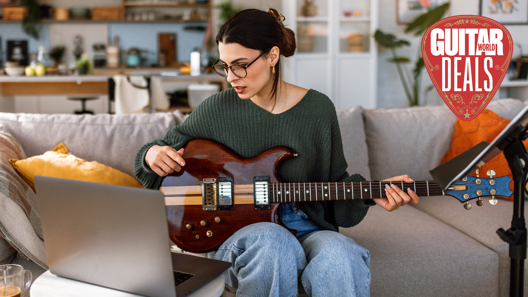 Female guitar teaches hosts an online lesson
